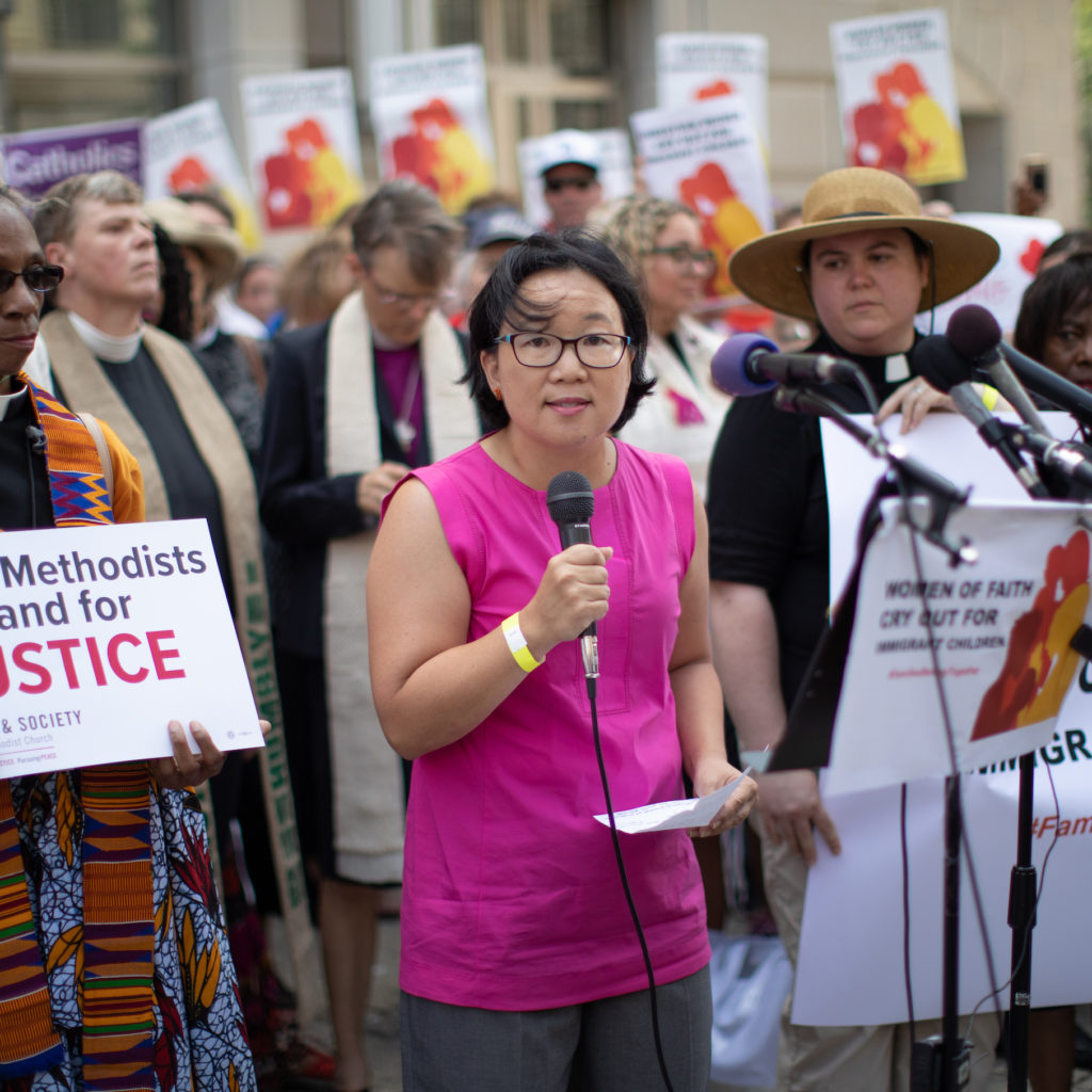 nikki toyama-szeto speaking at a rally